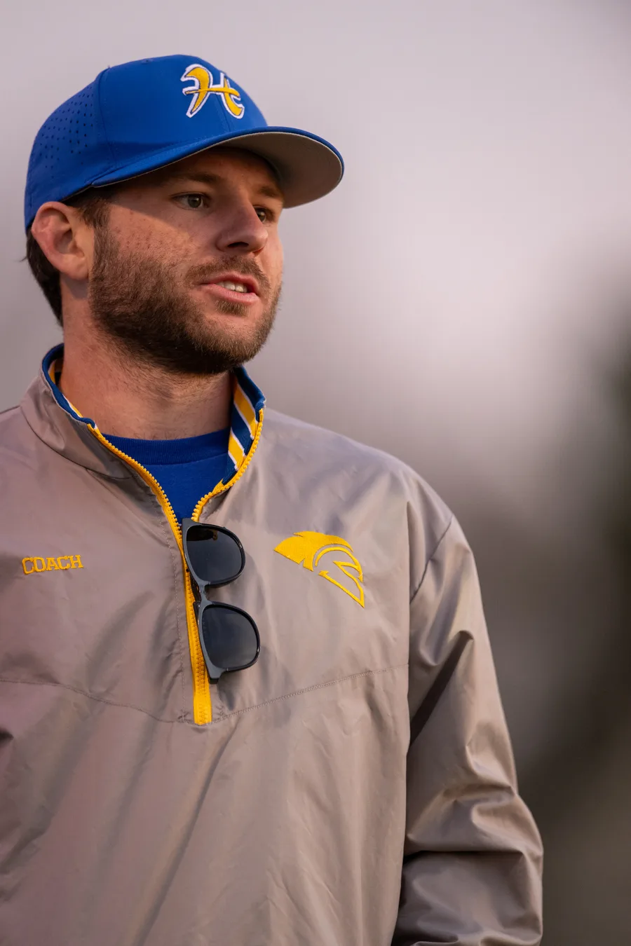 Coach Sam Anderson on the sideline in Homestead lacrosse coaching gear
